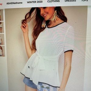 White and black tie blouse